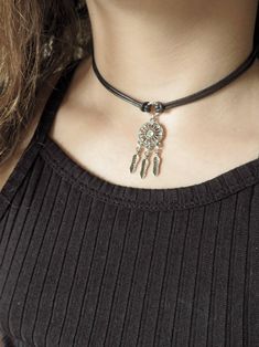 "Boho Choker, Leather Choker Necklace, Bohemian Feather Necklace, Native American Jewelry, Dream Catcher Necklace, Black Choker, Boho Jewelry ❤ BUY ANY 2 ITEMS ANS GET 15% OFF!! (USE COUPON CODE '15OFF') ❤ ❤ BUY ANY 4 ITEMS ANS GET 20% OFF!! (USE COUPON CODE '20OFF') ❤ ❤ BUY ANY 6 ITEMS AND GET 25% OFF!! ((USE COUPON CODE '25OFF') ❤ Complete any outfit with this unique gorgeous fashionable and trendy dream catcher leather choker necklace ! Made from 2mm leather cord, and 40mm dream catcher cryst Dragon Scale Necklace, Black Leather Choker, Dream Catcher Necklace, Choker Black, Leather Choker Necklace, Black Choker Necklace, Trendy Beach, Feather Necklace, Boho Choker