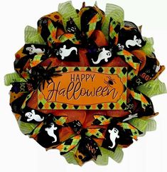 a wreath with halloween decorations on it