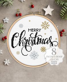 a cross stitch pattern with the words merry christmas on it