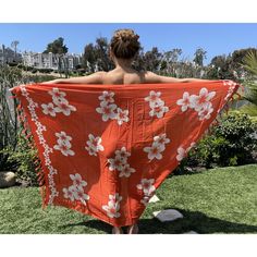 Our Hawaiian Plumeria Flower sarong in orange and white. The sarong is large enough to use as dress, skirt or anything you can create. Great for a beach Cover-Ups. The fabric is lite and has ultra soft feel to them. Can also be used as a Lava-Lava for the men. 100% Cotton Ultra Soft Color: Orange Plumeria Flowers Approximate Size: 58 inches by 44 inches Cover-Ups | Dress | Skirt | Top Handmade and printed White Floral Print Sarong For Beach Season, White Floral Print Beachwear Sarong, Beachy White Sarong For Beach Cover-up, White Beachy Sarong For Beach Cover-up, Traditional Red Sarong For Beach, Orange Sarong For Beach, Traditional White Sarong For Summer, Orange Sarong For Beach Season, Summer Orange Sarong For Vacation