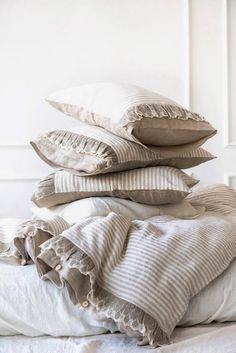 four pillows stacked on top of each other