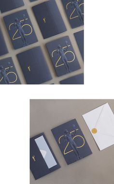 several photographs of different types of cards and envelopes with gold foil lettering on them