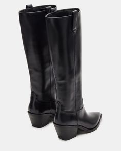 The STALLION boot is expertly crafted and designed with a pointed toe and knee-high length for a sleek and stylish look. These Western-inspired riding boots offer both durability and comfort for any riding or fashion needs. 2.5 inch heel height Size 6 measurements: 15 inch shaft circumference, 14.5 inch shaft height Size 8 measurements: 16.75 inch shaft circumference, 15.25 inch shaft height Size 10 measurements: 17.5 inch shaft circumference, 16 inch shaft height Leather upper material Textile Knee High Western Boots, Western Boots Women, Aesthetic Style, Western Boot, 5 Inch Heels, Western Boots, Aesthetic Fashion, Riding Boots, Knee High