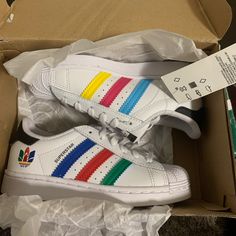 Brand New Playful Low-top Rainbow Sneakers, Playful Rainbow Low-top Sneakers, Multicolor High-top Sneakers For School, Colorful Playful Sneakers For Streetwear, Adidas Multicolor Low-top Sneakers, Multicolor School Sneakers With Rubber Sole, Yellow Adidas Synthetic Sneakers, Yellow Adidas Sneakers Synthetic, Adidas Yellow Synthetic Sneakers