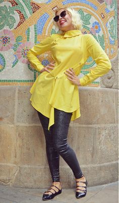 Extravagant lemon yellow blouse made of pure cotton, extremely soft at touch and light. Versatile blouse inspired by the bright light that shines over the speechless urban scenery of Barcelona. This asymmetrical blouse will for sure stand out from the crowd this fall. Material: 95% cotton, 5% elastane Care instructions: Wash at 30 degrees The model in the picture is size S. Can be made in ALL SIZES. If you have any other specific requirements, do not hesitate to contact me! I DO NOT CHARGE EXTRA Chic Yellow Asymmetrical Top, Spring Yellow Tops With Asymmetrical Hem, Yellow Tops With Asymmetrical Hem For Spring, Lemon Yellow Blouse, Urban Scenery, Asymmetrical Blouse, Yellow Blouse, Yellow Top, Bright Light