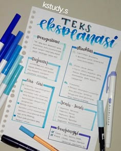 several pens are laying on top of a sheet of paper with the words teks esopcianasi