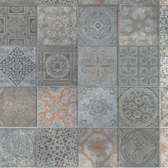 an assortment of different colored and patterned tiles