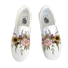 Wildflower Vans Slip Ons have been customized with a wildflower bouquet.  These Vans shoes have canvas uppers.  Vulcanized waffle rubber outsoles. For Men and Women.  We source each pair of shoes brand new directly from Vans.  The ink is permanent and will never come off. Made in the USA. This price includes everything: shoes, artwork, and shipping. Thanks for stopping by our Etsy shop! Please message us with any questions! Sizes listed are in US sizing scale. If you have any issues with your order, please feel free to reach out to us and we will be more than glad to help you! Note: Blvd Custom is in no way affiliated with any of the shoe brands or companies that are featured on our website. Each pair of shoes is ordered lawfully bought at retail price. White Custom Sneakers With Gum Sole For Spring, White Custom Sneakers With Rubber Sole For Spring, Spring Slip-on Custom Sneakers With Vulcanized Sole, Spring Canvas Custom Sneakers With Rubber Sole, Spring Canvas Custom Sneakers With Round Toe, Hand Painted Slip-on Sneakers For Spring, Hand Painted White Canvas Sneakers, Shoes Artwork, Vans Slip Ons