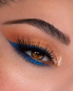 Navy Blue And Orange Eye Makeup, Gold Blue Makeup Looks, Make Up With Blue Eyeliner, Copper And Blue Makeup, Colourpop Blue Velvet Looks, Navy Blue And Gold Eye Makeup, Blue Orange Eyeshadow, Blue And Orange Eye Makeup, Eye Makeup Pop Of Color