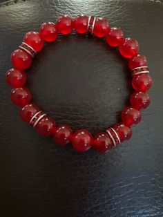 Red Jade beaded stretch bracelet Red Beaded Bracelets With Gemstone Beads, Red Gemstone Beaded Bracelets, Elegant Red Stretch Bracelet With Gemstone Beads, Elegant Red Gemstone Beads Stretch Bracelet, Elegant Red Stretch Bracelet With 8mm Beads, Elegant Red Hand-strung Stretch Bracelet, Red Crystal Bracelet With Spacer Beads, Adjustable Red Crystal Bracelet With Gemstone Beads, Adjustable Red Beaded Gemstone Bracelets