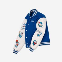 - Wool Varsity Jacket with Leather sleeves - Embroidery on front & back - Ribbed Cuffs - Snap enclosure - Embroidered Patches on sleeves - Woven Neck Label In Collaboration with Doraemon ©1970-2021 Fujiko Pro Spring Varsity Jacket With Embroidered Patch And Long Sleeve, Winter Embroidered Outerwear With Baseball Collar, Blue Long Sleeve Outerwear With Embroidered Graphics, White Embroidered Patch Long Sleeve Outerwear, White Long Sleeve Outerwear With Embroidered Patch, Embroidered Long Sleeve Varsity Jacket For College, Casual Cotton Outerwear With Embroidered Cuffs, Embroidered Fitted Varsity Jacket For Fall, Blue Outerwear With Embroidered Patch For Fall