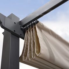 an umbrella is hanging on the side of a pole