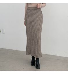 Upgrade your autumn-winter wardrobe with this high-waist pencil skirt, featuring a slimming design and seductive side slit. Crafted from a cozy knitted half wool fabric, this skirt combines warmth with style. The high waist enhances your silhouette while the pencil cut offers a sleek, sophisticated look. Ideal for both professional settings and elegant occasions, this skirt adds a touch of sexy sophistication to your cold-weather outfits. Jersey Pattern, Wool Knitted Dress, High Waisted Pencil Skirt, Cold Weather Outfits, Woolen Coat, Wool Dress, Skirt Leggings, Cozy Knits, Slim Waist