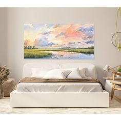 a bedroom scene with focus on the bed and painting hanging over it's headboard