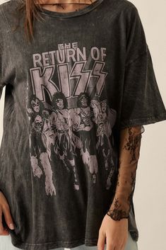 Mineral washed graphic t-shirt. Vintage-style KISS band graphic print with "The Return Of KISS" text. Round neckline. Short sleeves. Drop shoulder. Oversized fit. 100% Cotton. Imported top designed and printed in LA. Officially licensed KISS merchandise. Model wears size S. Kiss Merchandise, Kiss Band, Vintage Canvas, Iron Decor, Oversized Fits, Drop Shoulder, Round Neckline, Graphic Prints, Vintage Style