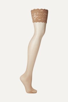 Wolford's 'Satin Touch' 20 denier stay-up stockings are spun from featherweight  sand stretch-nylon  for a barely-there finish. This pair has discreet shadow toe reinforcement for durability and delicate scalloped  lace  trims that are backed with  silicone  strips to hold them securely in place.   Wear it with: [Wes Gordon Skirt id516798], [Stella McCartney Blouse id585164], [Gianvito Rossi Pumps id569492], [Nina Ricci Shoulder bag id546234], [Jennifer Fisher Bracelet id503984], [Arme De L'Amou Elegant Micro-elastic Knee-high Stockings, Fitted Sheer Over-the-knee Hosiery, Beige Stretch Thigh-high Hosiery, Beige Stretch Thigh High Hosiery, Beige Sheer Thigh-high Stockings, Fitted Nylon Over-the-knee Stockings, Elegant Beige Micro-elastic Hosiery, Beige Stretch Over-the-knee Stockings, Elegant Over The Knee Tights