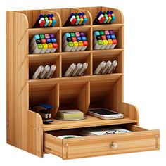 a wooden desk with a laptop computer on top of it and an office organizer next to it