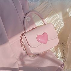 Spread the Love with the Pink Heart Girly Shoulder Bag – The Perfect Fashion Accessory for Women! Introducing the Pink Heart Girly Small Shoulder Bag – the perfect accessory for any fashion-forward woman! This adorable tote purse features a lovely pink heart design that exudes femininity and love. It comes with a chain top handle and a messenger bag strap, making it versatile enough for any occasion. Whether you’re going to a party or just running errands, this bag is the perfe Heart Bag Aesthetic, Pink Cute Things, Dollete Fashion, Cute Girly Things, Pink Heart Bag, Kawaii Purse, Fashion Coquette, Heart Purse, Square Shoulder Bag