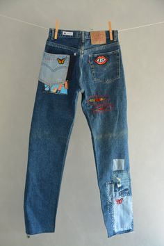 "Ready to send:Size-30 Unique vintage jeans One of a kind.. Hand made embroidery and unique patches. ---Or---- Made to order, in any size, within 6 working days . If you need different size, please send me a message and I will make you a special and unique design within 2 working days. They are all different! No one will have the same one as you have! Hand painted, one of kind jeans. You pick your size, model (slim- boyfriend- high waist- low waist) and primer color and you will get your singula Retro Patchwork Medium Wash Jeans, Retro Denim Bottoms For Festival, Grunge Patchwork Denim Jeans, Festival Straight Leg Denim Jeans, Vintage Straight Leg Bottoms With Collage Stitching, Straight Leg Denim Jeans With Collage Stitching, Vintage Bottoms With Collage Stitching And Straight Leg, Bohemian Straight Leg Recycled Denim Bottoms, Festival Denim Jeans With Patches