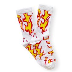 Staple Socks With A Crew Length And Ribbed Ankles. Finished With A Contrast Flame Motif. Content + Care - Includes 1 Pair - 75% Cotton, 23% Nylon, 2% Elastane - Machine Wash White Sports Socks For Winter, White Sporty Winter Socks, White Sporty Socks For Winter, Breathable Casual Winter Socks, Sporty Winter Socks For Streetwear, Casual Yellow Socks For Stocking Stuffers, Casual Cotton Sports Socks, White Winter Sports Socks, Casual Red Socks For Streetwear