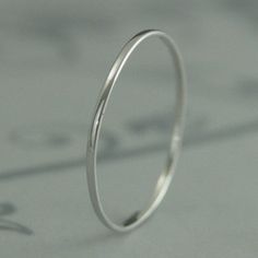 Simple Stackable Rings For Wedding, Simple Stackable Wedding Bands, Dainty Hypoallergenic Stackable Wedding Rings, Dainty Hypoallergenic Stackable Rings For Wedding, Simple Stackable Wedding Rings With Round Band, Simple Stackable Round Band Wedding Rings, Tiny Stackable Wedding Rings Round Band, Tiny Stackable Round Band Rings For Wedding, Simple Sterling Silver Midi Rings For Wedding