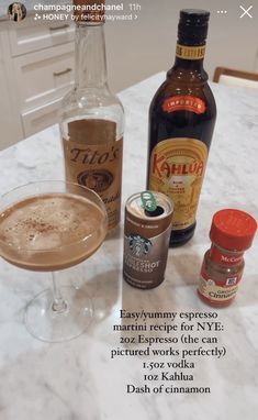 there are many different types of drinks on the counter top, including coffee and cinnamon