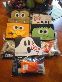 halloween treat bags are arranged on a table