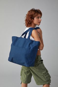 Oversized, easy, multi-pocket tote. Three large exterior pockets + three interior pockets. Comfortable carry straps + short handle straps. Sustainably and ethically handmade in India with 100% GOTS-certified organic cotton. Machine Washable. Stylish Lunch Bags, Family Box, Slouchy Bag, Backpack Lunch Bag, Satchel Tote, Travel Kits, Zip Pouch, Reusable Bags, Mini Crossbody