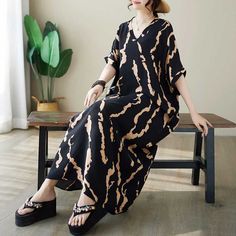 Sku CY-!124969 Material Cotton Style Bohemian Feature Printed Neckline V-neck Occasion Casual, Vintage, Stylish Seasons Spring, Summer Type Maxi Dress Color Black, Navy Size M, L, XL Size Chart: Please consult the size chart we provide for this item's measurements to help you decide which size to buy. Please note: There may be 1-3cm differ due to manual measurement. CM Bust Waist Length M 150 34 129 L 152 35 130 XL 154 36 131 Casual Printed V-neck Maxi Dress, Casual Black Short Sleeve V-neck Dress, Black V-neck Mini Dress For Vacation, Black Casual Maxi Dress With Relaxed Fit, Casual Black Relaxed Fit Maxi Dress, Black Bohemian V-neck Dress, Black Relaxed Fit Maxi Dress For Spring, Black Maxi Dress With Relaxed Fit For Spring, Black Casual V-neck Short Sleeve Dress