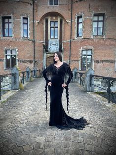 Long Gothic Wedding Mermaid Dress with Train Inspired by Morticia Addams ✨ The dress is made to your measurements in a black elastic velvet which makes the dress easy to put on and comfortable to wear. The Morticia dress can be made in these 3 versions: 1: Basic (only velvet) = only the basic dress without embroidery, without lace and without pearls/rhinestones 2: Velvet & Lace = The basic velvet dress + embellishment with lace and embroidered appliqués 3: Luxury (Velvet+Lace+Rhinestones) = The Mermaid Dress With Train, Wedding Mermaid Dress, Morticia Addams Dress, Morticia Addams Costume, Gothic Mermaid, Wedding Mermaid, Elegant Goth, Dress With Train, Gothic Wedding Dress