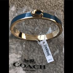 Brand New Coach Bangle With Tags Gold And Indigo Hinged Opening Designer Blue Bracelet Jewelry, Chic Coach Bangle Bracelet, Chic Coach Bracelet Jewelry, Chic Coach Bracelet, Chic Blue Jewelry For Formal Occasions, Coach Bangle, Coach Fashion, Coach Jewelry, Dream Jewelry