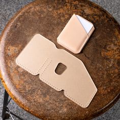 a leather case sitting on top of a wooden table