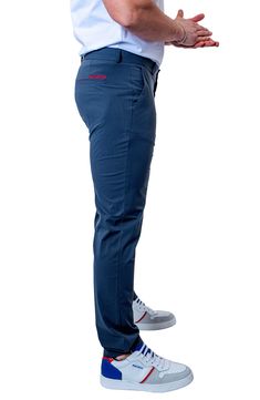 A stretchy and slim fit destines these timeless pants for all-day comfort and endless style no matter what you pair them with. Zip fly with button closure Front slant pockets; back welt pockets 85% polyamide, 15% elastane Hand wash, dry flat Made in Turkey Business Casual Chinos With Five Pockets, Elastane Chinos For Business Casual, Business Casual Elastane Chinos, Slim Fit Pants For Business Casual, Elastane Tapered Leg Chinos For Business Casual, Stretch Chino Cotton Twill Straight Pants, Tapered Leg Elastane Chinos For Business Casual, Stretch Straight Chino Cotton Twill Pants, Business Casual Tapered Leg Elastane Chinos