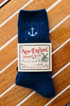 Put your coziest foot forward in our limited edition New England donegal socks. It's our spin of the yarn take on an Irish classic. We kept the signature feel and flecks you're used to in a donegal but added a distinctly New England touch with our seaside embroidery. Product Details: One size fits most Wash cold, lay flat to dry Imported Please note, we do not accept returns on our New England Donegal Socks. All purchases are final. Kiel James Patrick, Embroidery Product, Monogram Outfit, Sweater Socks, Navy Anchor, Spoiled Rotten, Sunglasses Strap, James Patrick, Framing Photography