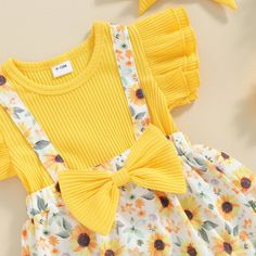 Includes: Romper & BowMaterial: Polyester BlendGender: GirlsPattern: FloralSleeve Length: ShortSummary: Baby Toddler Yellow Short Sleeve Ruffle Bow Sunflower Romper with Matching Bow 2 Piece Set Yellow Outfits, Infant Baby Girl, Casual Work Dresses, Kids Activewear, Mommy And Me Dresses, Newborn Boy Clothes, Baby Shower Outfit, Baby Boy Clothes Newborn