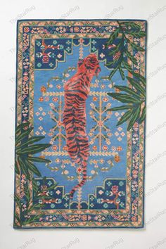 a blue rug with a tiger on it