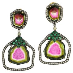 The watermelon tourmaline gemstones have a stunning pink and green color that is reminiscent of the fruit they are named after. The emerald gemstones add a rich, vibrant green color to the earrings, while the pave diamonds add a touch of sparkle and elegance. 18k:2.14g, Diamond:1.7ct, Silver:12.26gm, Emerald:0.80ct, Tourmaline:40ct Size: 49X26MM" Celtic Wedding Bands, Jewelry Halloween, Tourmaline Earrings, Halloween Sale, Emerald Earrings, Watermelon Tourmaline, Emerald Gemstone, Tourmaline Gemstone, Color Rosa