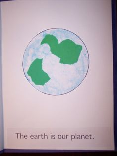 the earth is our planet book with green paper cutouts on it's cover