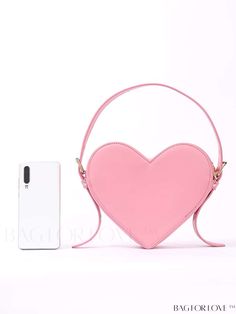 BagForLove - Pink Heart-Shaped Novelty Bag with Adorable Top Handle Product Description Color Pink Type Novelty Bag Strap Type Adjustable Pattern Type Plain Composition 100% Polyurethane Material PU Leather Size Chart INCH CM Strap Length Bag Height 5.9 inch 7.1 inch Strap Length Bag Height 15 cm 18 cm Details Pictures Similar Products h2 { text-align: center; } /* æ¢è�¡ */ li{ white-space: normal; word-break: break-all; word-wrap: break-word; } .red-box { width: 100%; display: flex; flex-direc Novelty Bags, Word Wrap, Cute Top, Bag Straps, Cute Tops, Pink Heart, Bags Shoulder, Top Handle, Colorful Backgrounds