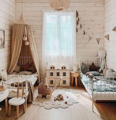 a room filled with lots of furniture next to a white brick wall and wooden floors