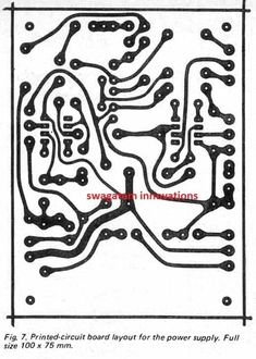 the circuit board layout for the power supply, which is shown in black and white