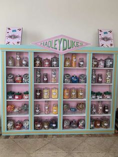 a display case filled with lots of different types of candy and candies on top of shelves