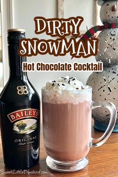 a hot chocolate cocktail with whipped cream and sprinkles