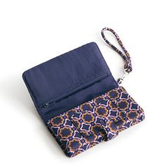 Add a touch of elegance and functionality to your accessory collection with our stylish Phone Wristlet. Designed for the modern woman on the go, this versatile accessory offers a compact and organized solution for carrying your essentials, making it the perfect choice for evenings out, shopping trips, travel and more. Featuring a detachable wristlet strap, the Phone Wristlet provides added convenience and versatility, allowing you to carry it as a wristlet, clutch, or wallet depending on your st Adjustable Wristlet With Removable Pouch For Travel, Elegant Wristlet With Adjustable Strap For Travel, Adjustable Clutch Wristlet For Travel, Elegant Wristlet With Removable Pouch For Travel, Elegant Travel Wristlet With Removable Pouch, Elegant Wristlet With Cell Phone Pocket, Adjustable Clutch Wallets For Travel, Adjustable Clutch For Travel, Phone Wristlet