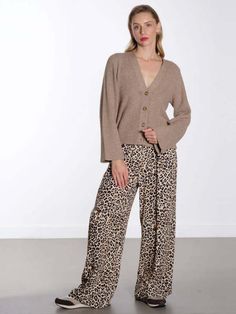 Feel comfort and style with the leopard pants by marta. these pull-on trousers are made from a light weight viscose with an elasticated waistband and wide leg. perfect for the summer months wear them with a vest and sandals.    model wears a size s/m.    details    - leopard print pants  - high-waisted  - elasticated waistband  - side pockets  - wide leg  - relaxed fit  - lightweight fabric  - pull on    fabric   care    composition: 100% viscose.    care: 30c machine wash. iron on a medium heat. do not tumble dry. Casual Wide Leg Viscose Pants For Fall, Casual Viscose Wide Leg Pants For Fall, Fall Wide Leg Viscose Bottoms, Viscose Wide Leg Bottoms For Fall, Wide Leg Viscose Bottoms For Fall, Leopard Print Wide Leg Bottoms With Relaxed Fit, Casual Leopard Print Wide-leg Pants, Leopard Print Wide Leg Bottoms For Work, Casual Wide-leg Leopard Print Pants