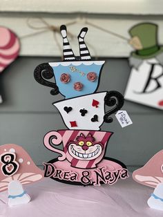 there is a card that has been made to look like alice and the wonderland tea party