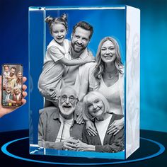 a glass block with a family photo on it