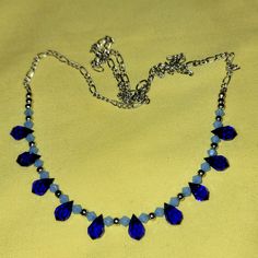 Nwt. Royal & Frosted Blue With Silver Inserts. Necklace Is On A 925 Chain With No Clasp. Beautifully Designed. Measures Appx 23" Blue Necklace With Lobster Clasp For Party, Elegant Blue Crystal Necklaces With Adjustable Chain, Elegant Blue Crystal Necklace With Adjustable Chain, Elegant Blue Jewelry With Silver Chain, Blue Costume Jewelry Necklaces With Lobster Clasp, Elegant Blue Sterling Silver Crystal Necklaces, Elegant Blue Sterling Silver Crystal Necklace, Elegant Blue Crystal Sterling Silver Necklace, Elegant Blue Necklace With Silver Chain