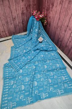 Mix elegance and beauty with a six-yard drape is the only leisurely collection of 2024 in light blue color with unparallel machine floral embroidery work on the body, pallu, and scallop border which is donned in the saree. With allover resham checks to bring out the elegance. Color: A shade of light blue color Technique: Amazing work of machine embroidery work done with a scallop border on the saree and resham checks work Fabric: Resham Kota Saree With Embroidery Work, Checks Saree, Scallop Border, Shades Of Light Blue, Color Techniques, Designer Blouse, Work Sarees, Light Blue Color, Embroidery Work