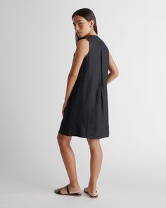 Sleeveless style with a little swing. This spring summer staple can do it all. Featuring pin-tucking up top, shell buttons, and pleat detailing. Our linen collection is made from 100% European flax linen—an eco-friendly, and resource light material.  | Quince | Women's 100% European Linen Sleeveless Swing Dress in Black, Size XL Pleated A-line Sleeveless Dress For Daywear, Summer Sleeveless A-line Dress With Pleated Hem, A-line Sleeveless Dress With Pleated Hem For Spring, Summer A-line Sleeveless Dress With Pleated Waist, Summer A-line Sleeveless Dress With Pleated Hem, Summer Dresses With Pleated Hem, Casual Pleated Linen Dress For Summer, Summer Pleated Linen Dress, Spring A-line Sleeveless Dress With Pleated Hem